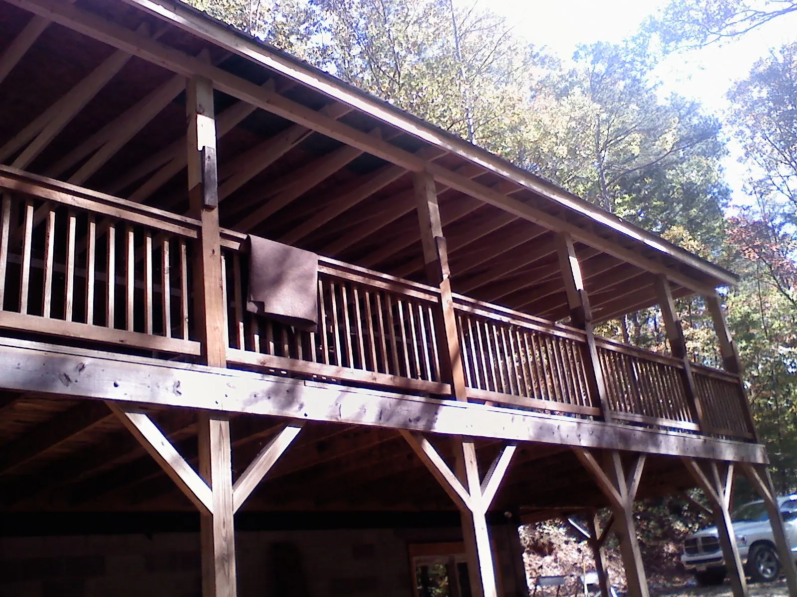 Timber framing under a new elevated porch and deck — Roof Leak Repair in Harlan by Roofing Brothers